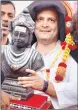  ??  ?? Rahul receives a a souvenir during his public meeting in Basavakaly­an at Bidar