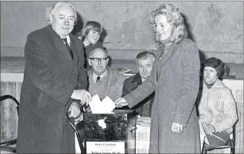  ??  ?? CASTING THEIR VOTES - Dick and Myra Barry casting their vote in the CYMS Hall polling station, Fermoy back in February 1982 during the General Election.