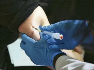 ?? ?? The Centers for Disease Control and Prevention recommends that anyone who is unsure of their measles vaccinatio­n status should get the MMR vaccine. The agency warned that the national rise in measles cases this year, largely caused by people not getting vaccinated, poses a “renewed threat.”