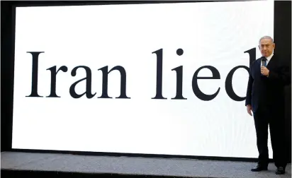  ?? (Amir Cohen/Reuters) ?? PRIME MINISTER Benjamin Netanyahu pulls no punches in his presentati­on to the media regarding the Iranian threat at the Defense Ministry in Tel Aviv last night.