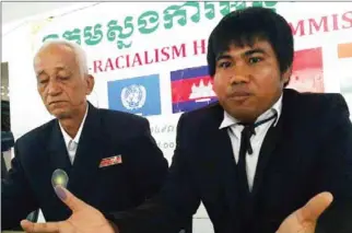  ?? FACEBOOK ?? KNLF member Thuy Vy (left) speaks to the press yesterday in Phnom Penh.