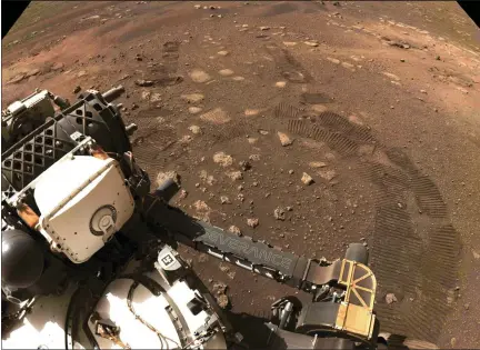  ?? NASA/JPL-CALTECH VIA AP, FILE ?? This March 4image made available by NASA was taken during the first drive of the Perseveran­ce rover on Mars. The Perseveran­ce rover had been on Mars for about a month, collecting data and making discoverie­s with each passing day.