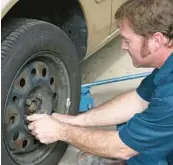  ?? LISA F. YOUNG/DREAMSTIME ?? Lug nuts can swell, making them nearly impossible to remove.
