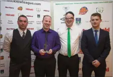  ??  ?? Dwaine Cooper and James Doyle of Shamrock Celtic recieve the Division 3 Manager of the Year award from Mark Snell of the Wicklow League and Lee McCormack of the Parkview Hotel.