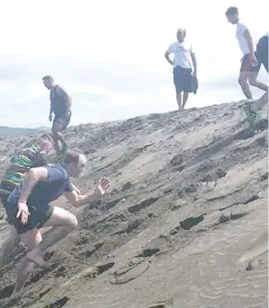  ?? Photo:
The Armoured Tigers ?? Team members train on the
Sand Dunes in Sigatoka.