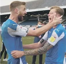  ??  ?? Posh centre-back pairing Mark Beevers (left) and Frankie Kent.