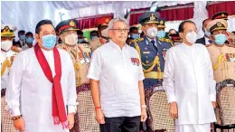  ??  ?? Except for President Gotabaya Rjapaksa all those in attendance including Prime Minister Mahinda Rajapaksa and former President Maithripal­a Sirisena wore masks