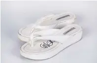  ??  ?? Sandals donated by X-Files star Gillian Anderson