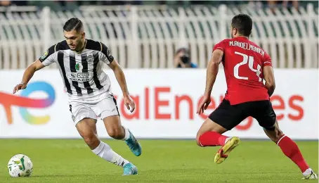  ?? AFP/File ?? Setif’s Abdelmoume­ne Djabou during a match against Al-Ahly. As two successful teams in African football, it is no surprise that Al-Ahly and Wydad have history.