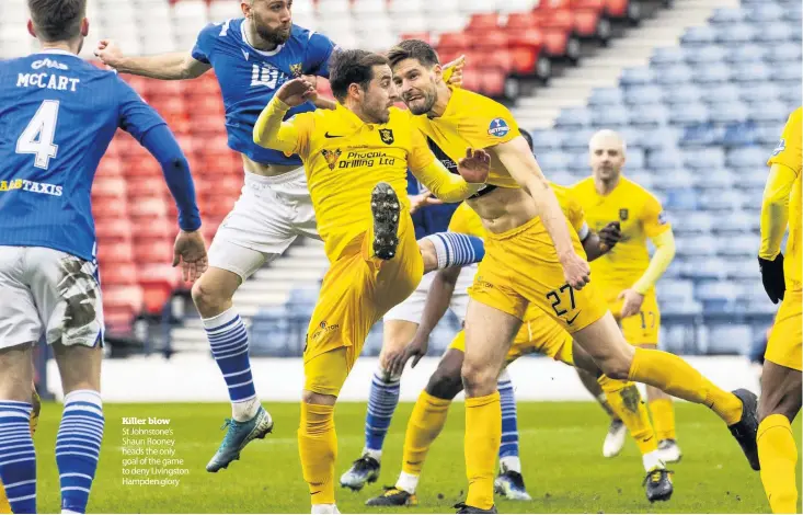  ??  ?? Killer blow
St Johnstone’s Shaun Rooney heads the only goal of the game to deny Livingston Hampden glory