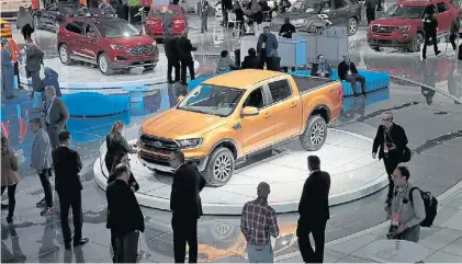  ??  ?? Estrellas. La pick up de Ford en el Salón del Automóvil en Detroit. Esos vehículos fueron los más requeridos.