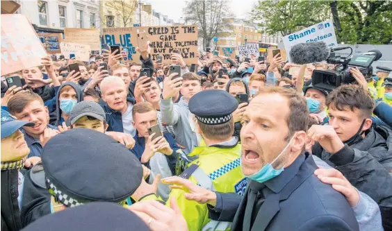  ?? Photo / Getty Images ?? Chelsea’s technical director Petr Cech argues with fans protesting against Super League before the match between Chelsea and Brighton.