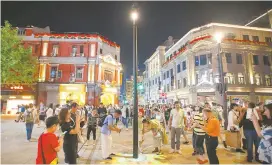  ??  ?? China’s first electric-arc lamp was lit by the Shanghai Electric Co on Nanjing Road in 1882, marking the beginning of the city’s modern developmen­t. A replica of that lamp has been erected on the original site.