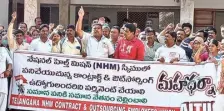  ?? ?? NHM contract employees staging a protest outside the office of Commission­er of Health and Family Welfare in Hyderabad.