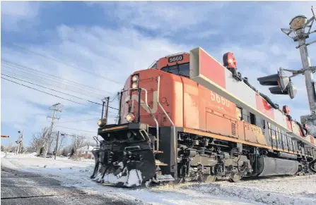  ?? REUTERS ?? A CN Rail train travels westward on a track in Montreal.