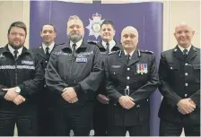  ??  ?? Sgt Michael Johnson, PC Danny Cummings, PC Craig Farrington and PC Nathan Southerlan­d with Chief Constable Nick Dean