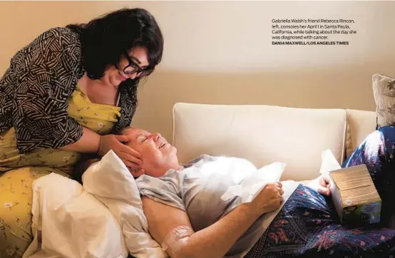  ?? DANIA MAXWELL/LOS ANGELES TIMES ?? Gabriella Walsh’s friend Rebecca Rincon, left, consoles her April 1 in Santa Paula, California, while talking about the day she was diagnosed with cancer.