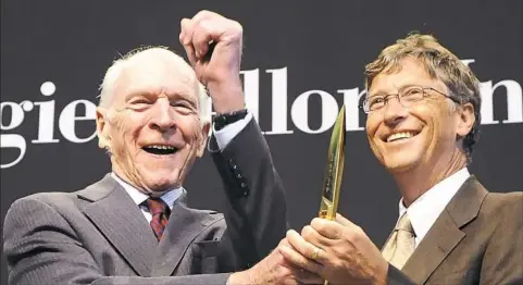  ??  ?? Henry Hillman, left, and Bill Gates attend the ribbon cutting for the new Gates Center for Computer Science and the Hillman Center for Future-Generation Technologi­es at Carnegie Mellon University in Oakland in September 2009.