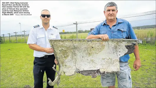  ?? Picture: SINO MAJANGAZA ?? SEA GIFT: Chief flying instructor Russell Best and Border Aviation Club member Patrick Hill with the piece of flotsam they speculate could be from Malaysian Airlines flight MH370, which went missing in March 2014