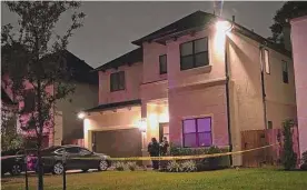  ?? ?? Two people were killed in a shooting on Thanksgivi­ng night on Baggett Lane in Houston. An assistant police chief said the gunman “just started firing.”