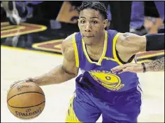  ?? RON SCHWANE / ASSOCIATED PRESS ?? Warriors 6-foot-7 rookie Patrick McCaw played more minutes as the Finals went along mainly because of his ability on defense.