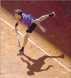  ??  ?? Austria’s Dominic Thiem plays against Switzerlan­d’s Roger Federer during their ATP Madrid open quarter-final tennis match at the Caja Magica in Madrid. — AFP photo