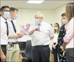  ?? ?? Prime Minister Boris Johnson, Chancellor Rishi Sunak and MP Tracey Crouch at the Kent Oncology Centre