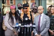  ?? ASHLEE REZIN — CHICAGO SUN-TIMES VIA AP ?? Flanked by family members, attorneys and supporters, Dexter Reed’s mother, Nicole Banks, speaks to reporters outside the headquarte­rs for the Civilian Office of Police Accountabi­lity in West Town, Chicago, Tuesday.