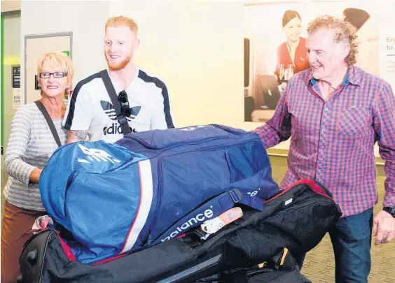  ?? Picture / Getty Images ?? Suspended star all-rounder Ben Stokes is greeted at Christchur­ch Airport yesterday by his mum and dad, Deborah and Gerard.