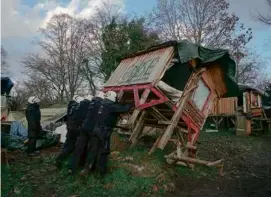  ?? INGMAR NOLTING/NEW YORK TIMES ?? Police removed activists’ structures last week as part of the clearing of Lützerath, Germany.