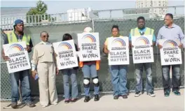  ??  ?? Rainbow PUSH members block a White Castle constructi­on site and demand that black workers get a share of the jobs.
| RAINBOW PUSH COALITION