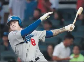  ?? John Bazemore Associated Press ?? THE DODGERS made the biggest acquisitio­n of the season by getting Manny Machado, but will his bat be enough to get them over the top in October?