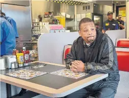  ?? LACY ATKINS/THE ASSOCIATED PRESS ?? Ronald Page becomes emotional as he waits for his breakfast at the reopened Waffle House in Antioch, Tenn. Page’s daughter was a sorority sister of DeEbony Groves, one of the victims of Sunday’s shooting.