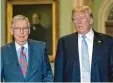  ?? Foto: J. Scott Applewhite/AP/dpa ?? Früher Hand in Hand, heute Gegner: Mitch McConnell (links) und Donald Trump.