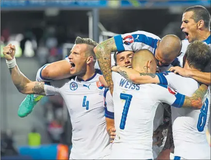  ?? Picture: Getty ?? PUNCHING ABOVE THEIR WEIGHT: Nations such as Slovakia have proved Scotland are underperfo­rming.