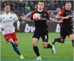  ?? ?? HAMBURG: Freiburg’s German midfielder Maximilian Eggestein controls the ball during the German Cup semifinal match against Hamburg on April 19, 2022. —AFP