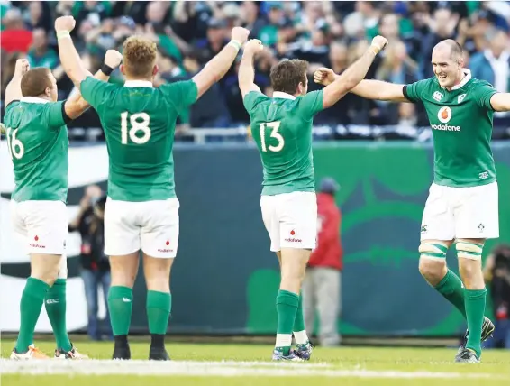  ?? PICTURE: Getty Images ?? Craic’d it: Ireland are ecstatic after their shock victory over the All Blacks in Chicago