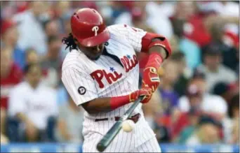  ?? DERIK HAMILTON — THE ASSOCIATED PRESS ?? The Phillies’ Maikel Franco hits a double off the Red Sox’s Chris Sale during the second inning Thursday in Philadelph­ia. Franco has shown recent glimpses of coming out of his season-long slump.