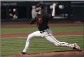  ?? ASHLEY LANDIS — THE ASSOCIATED PRESS ?? San Francisco Giants starting pitcher Alex Wood throws during the first inning of a spring training game against the Chicago White Sox on Thursday in Scottsdale, Ariz.