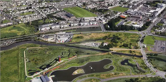  ??  ?? Aerial of the west side of Tralee, showing The WetlLands The Marine, Basin, Kerins O’Rahillys GAA grounds, Kerry Group Buildings, The Low Field, and most of Strand Road area. johncleary­photo.com