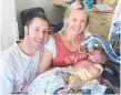  ??  ?? Brooke Hanson and her husband Jared Clarke with baby Jack in 2012.