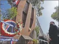 ?? (File Photo/ap/reed Saxon) ?? A U.S. Army soldier pauses in September 2013 at a column from the South Tower of the World Trade Center at the Los Angeles Fire Department’s Sept. 11 remembranc­e ceremony.