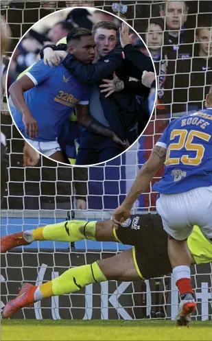  ?? ?? Alfredo Morelos celebrates with the fans (inset) after his winner following Kemar Roofe’s leveller from the spot