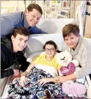  ?? SUBMITTED PHOTO ?? Kennedy Allison is recovering in Children’s Hospital in Little Rock after passing out at school Friday, Jan. 11. Her parents Keith and Jennifer Allison and brother Landon are keeping her company.