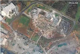  ?? MAXAR TECHNOLOGI­ES VIA AP ?? A 2017 satellite photo (top) shows the Mayfield Consumer Products factory and buildings; the bottom photo shows the destructio­n from Friday’s tornadoes.