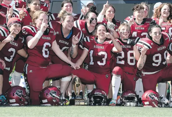  ?? TROY FLEECE ?? The Regina Riot celebrate their 34-24 victory over the Saskatoon Valkyries in the WWCFL semifinal game at old Taylor Field in Regina.