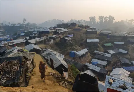  ?? AFP ?? Rohingya at the Balukhali refugee camp in the Bangladesh­i district of Ukhia, above, could soon return home after a new deal