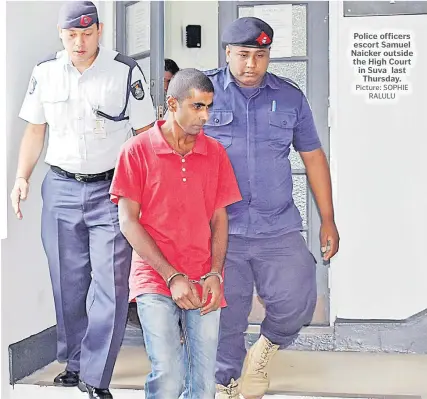 ?? Picture: SOPHIE RALULU ?? Police officers escort Samuel Naicker outside the High Court in Suva last Thursday.
