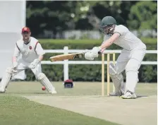  ??  ?? South Shields batsman Chris Rainbow goes on the attack against Dawdon.