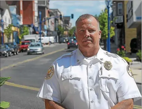  ?? GENE WALSH — DIGITAL FIRST MEDIA ?? Phoenixvil­le Police Chief William Mossman stands outside the police station on Bridge Street in Phoenixvil­le. Mossman retired fromthe police department on Friday after 25years and will become chief of police of East Coventry Township.